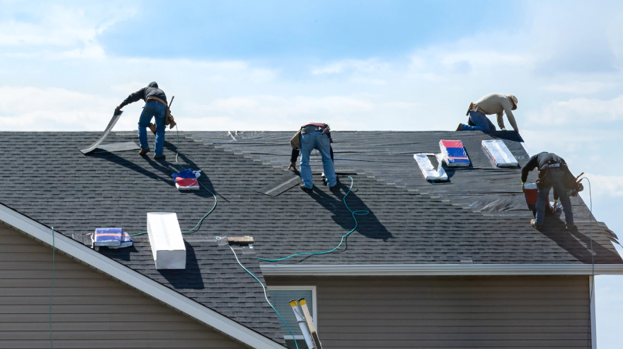 roofers during a shingle roof replacement humble tx